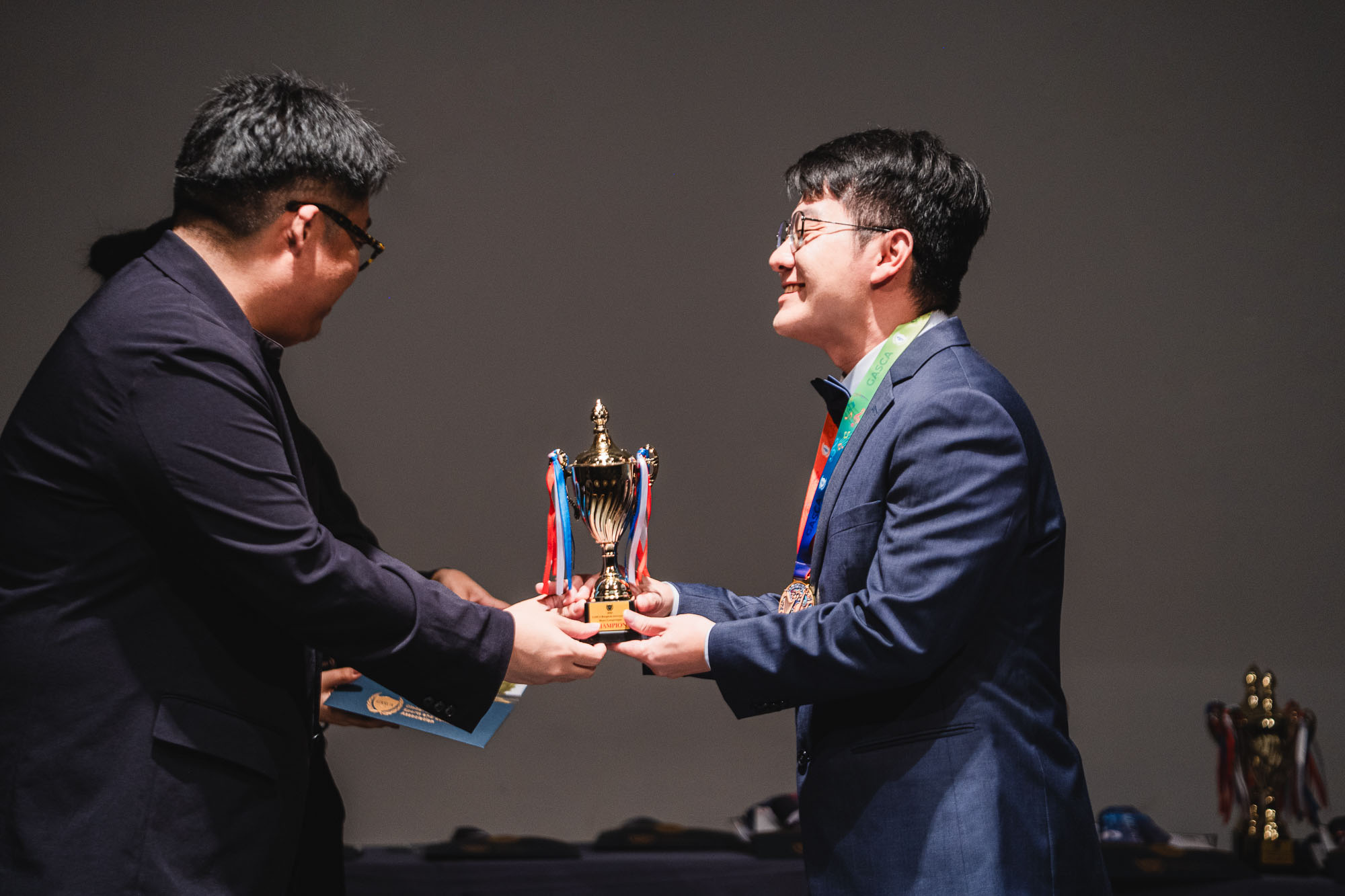 Trophy being presented on stage during the award ceremony